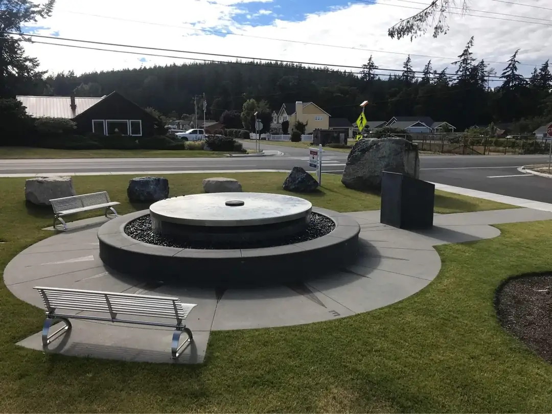 A distant perspective of the Bellevue custom concrete installation, showing its integration with the landscape.