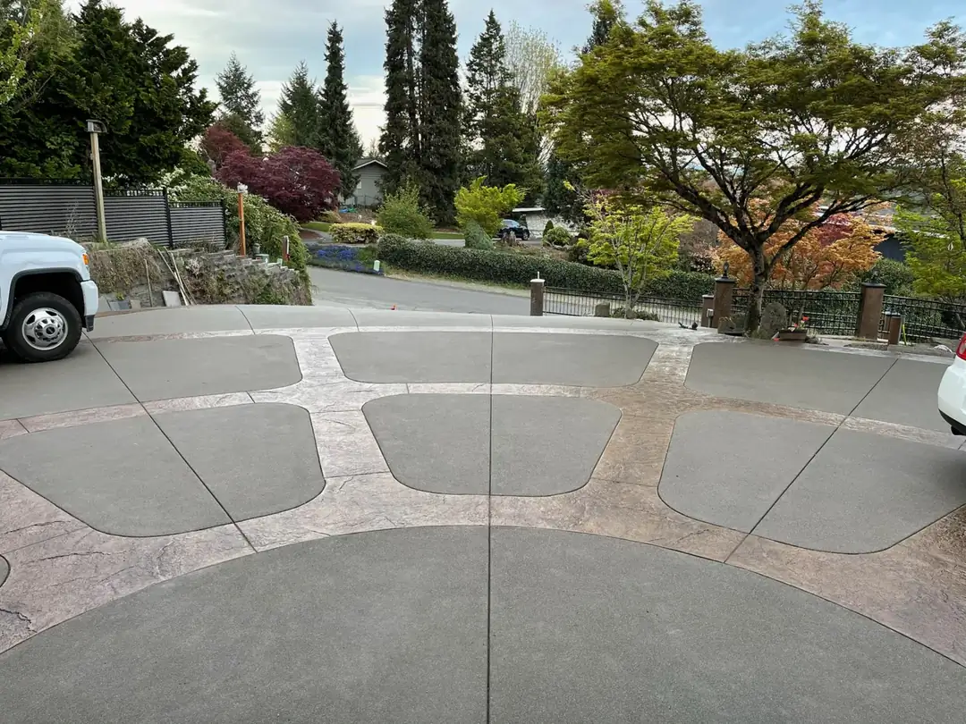 Overhead view from the garage showing the full scope of the artistic driveway pattern.