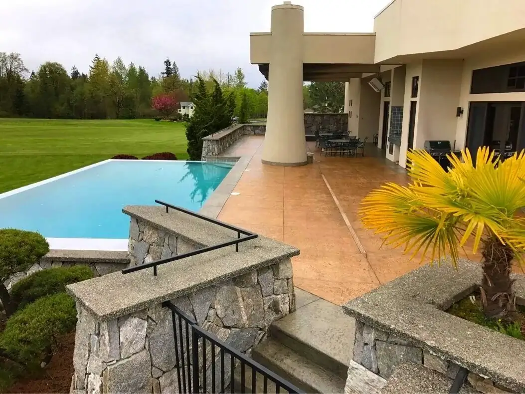 Stamped Concrete Patio with Pool Deck and Integrated Lighting in ...